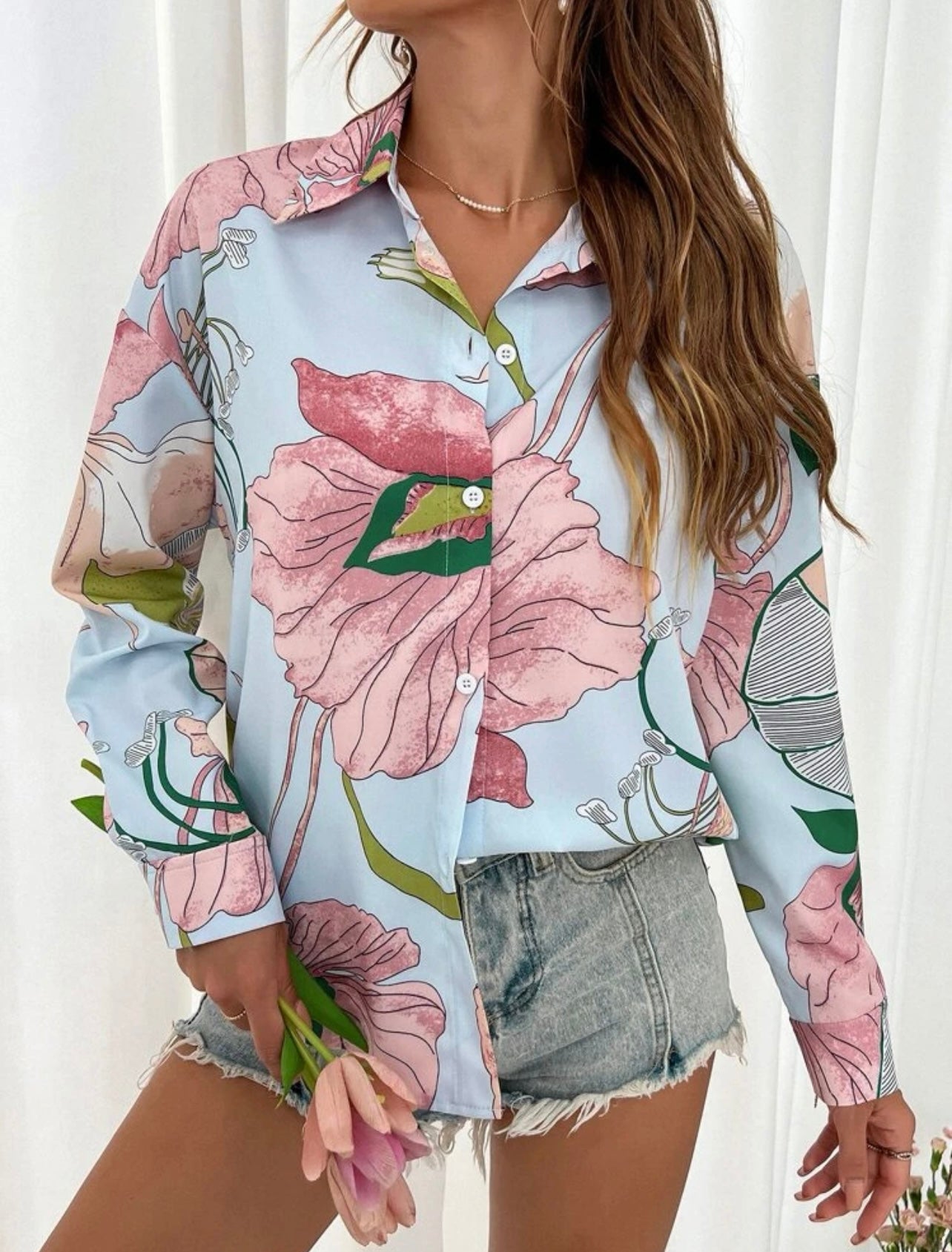 Camisa con estampado floral de hombros caídos