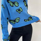 Jersey con patrón de mariposa de hombros caídos