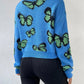 Jersey con patrón de mariposa de hombros caídos
