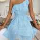 Vestido con estampado polka dots y vuelos en capas